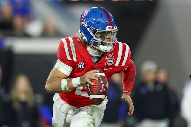 Jan 2, 2025; Jacksonville, FL, USA; Mississippi Rebels quarterback Jaxson Dart (2) drops back to pass against the Duke Blue Devils in the second quarter during the Gator Bowl at EverBank Stadium. Mandatory Credit: Nathan Ray Seebeck-Imagn Images Jaxson Dart