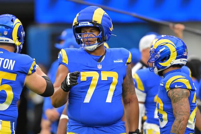 Jan 4, 2026; Inglewood, California, USA; Los Angeles Rams offensive tackle Alaric Jackson (77) on the field prior to a game against the Arizona Cardinals at SoFi Stadium. Mandatory Credit: Jayne Kamin-Oncea-Imagn Images